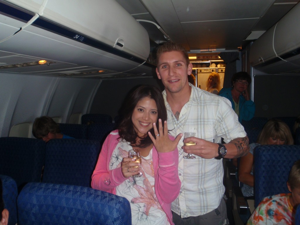 The Cooks celebrate their engagement at 35,000 feet in the air!