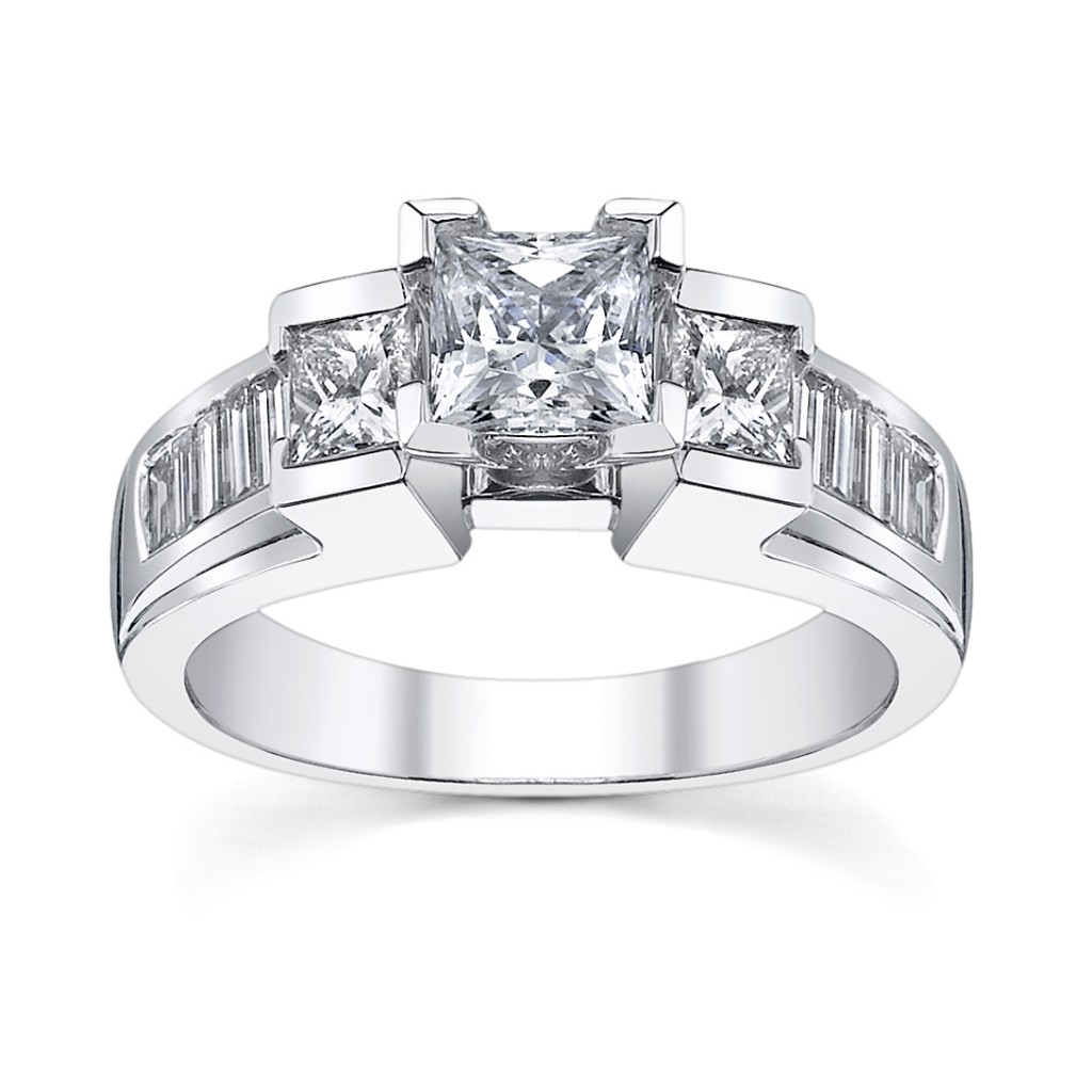Modern three-stone engagement ring with baguettes available at www.RobbinsBrothers.com (sku0361260)