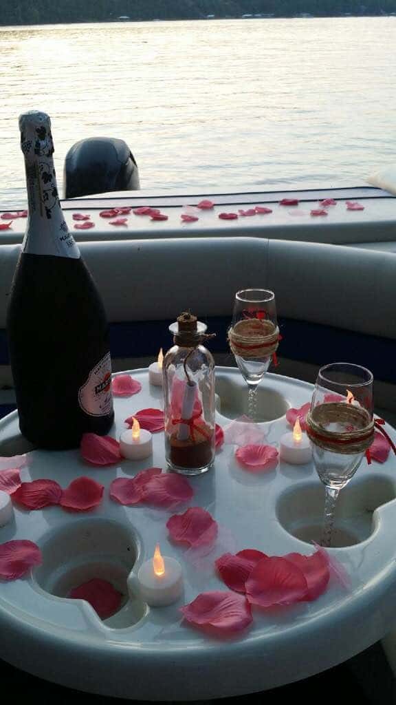 A romantic surprise marriage proposal for Ashlee. Surrounded by champagne and rose petals...she said YES.