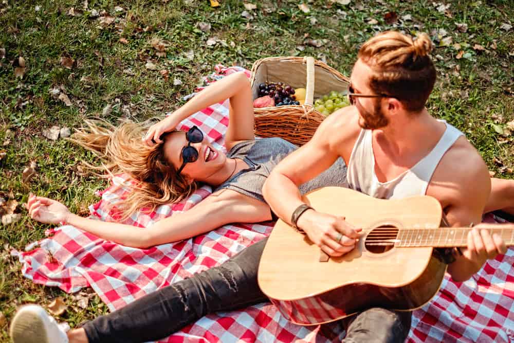 Couple having a Picnic - turn up the romance in your relationship