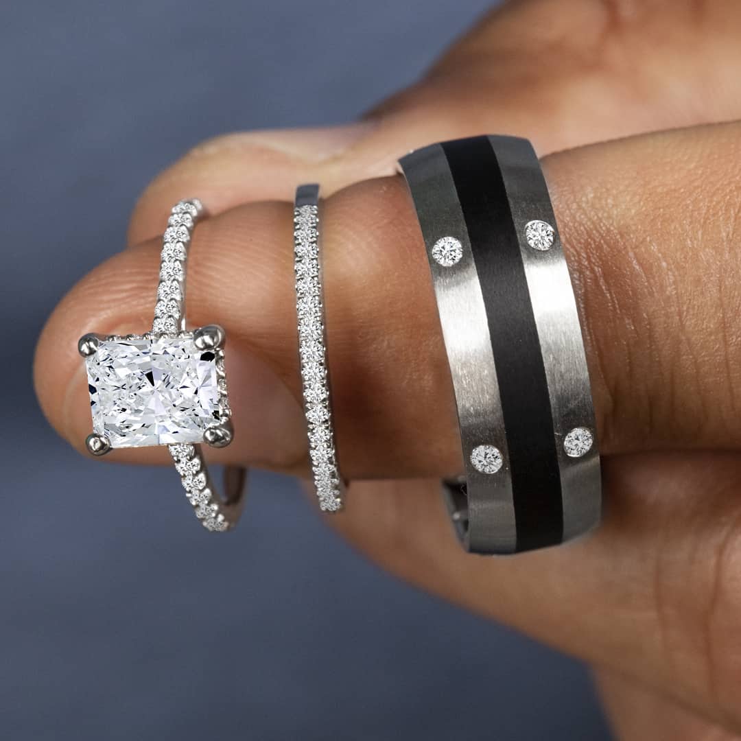 Elegant minimalist matching wedding bands in white gold with clean lines