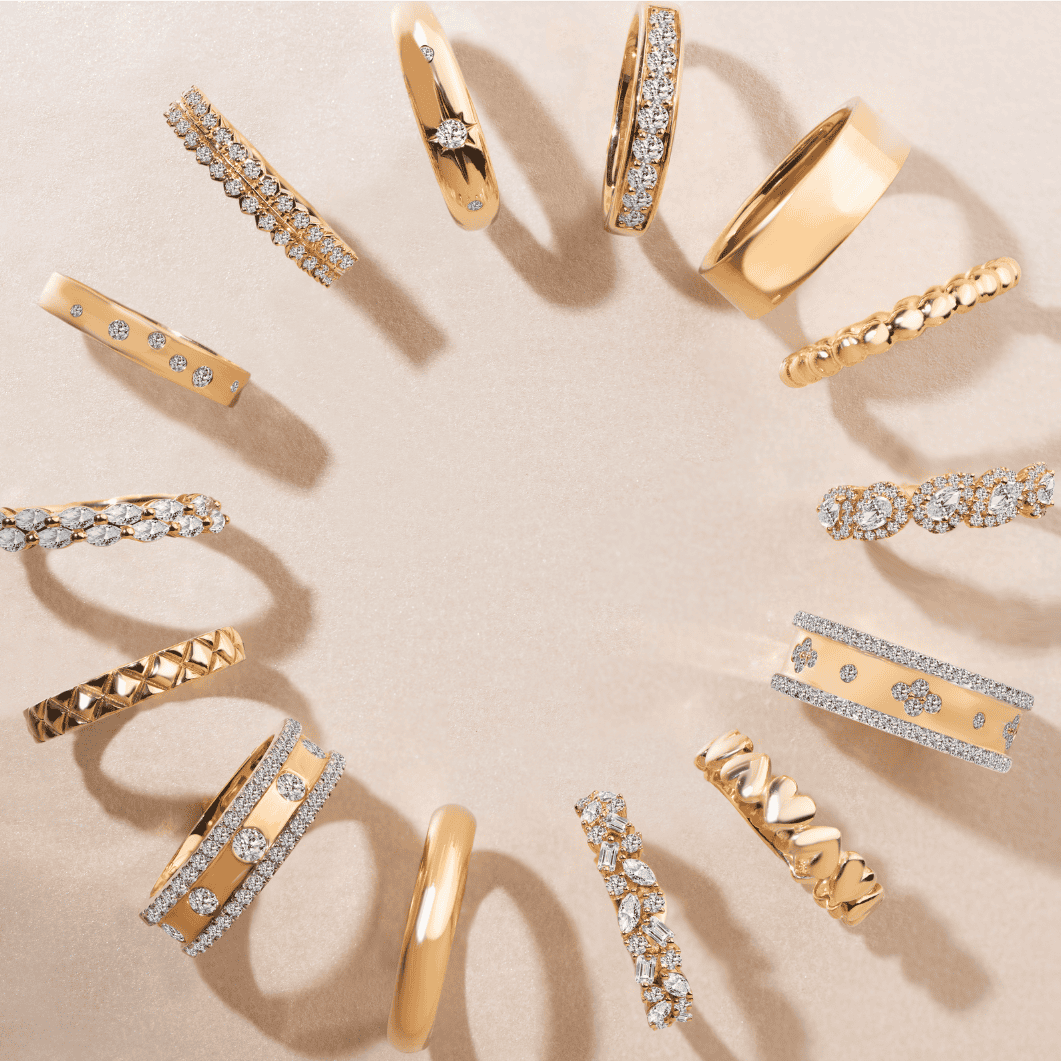 A collection of matching and complementary couples wedding bands in several metals