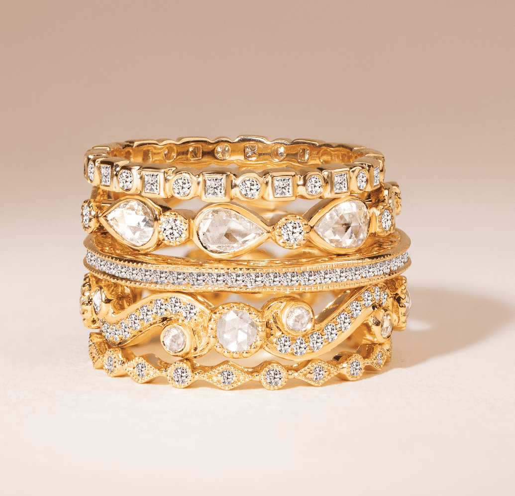 Sethi 18k yellow gold womens wedding bands with diamond detailing