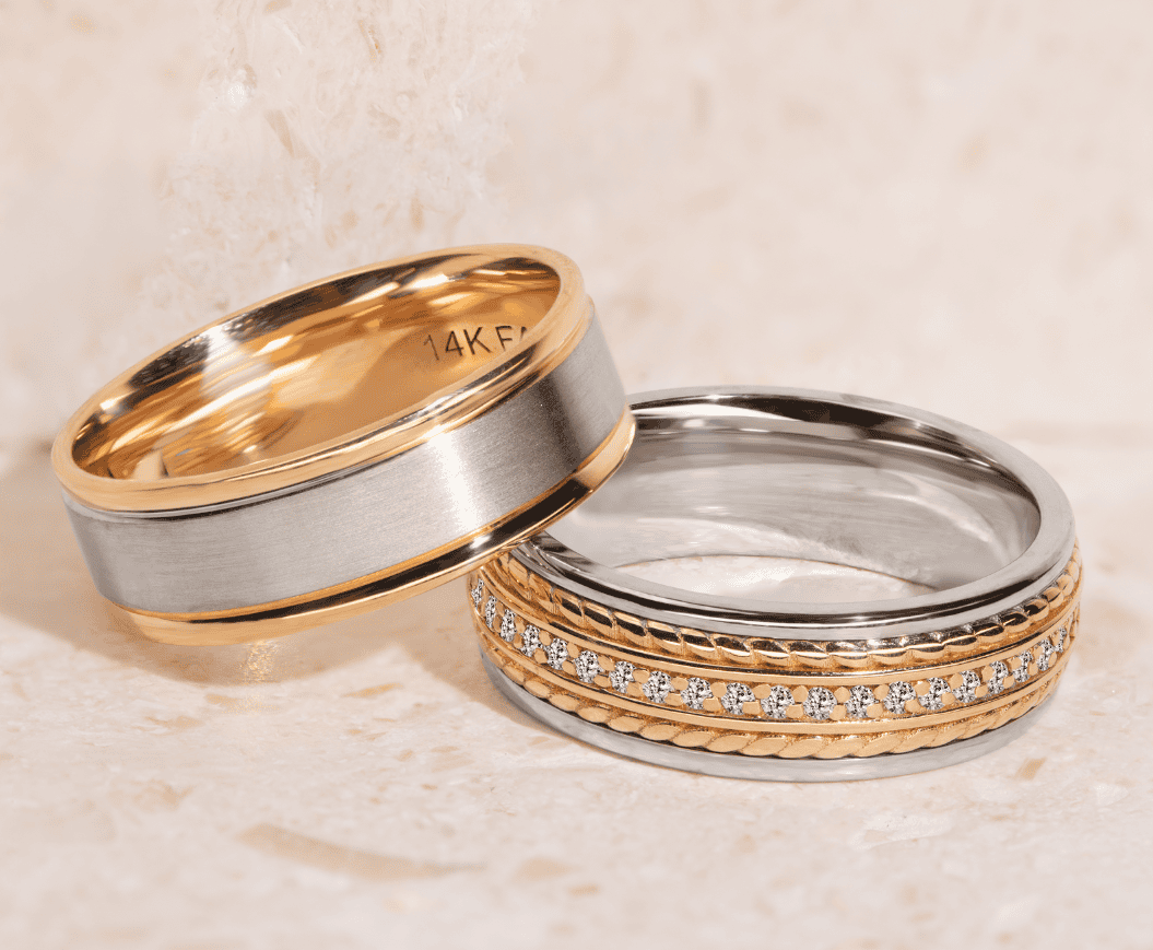 Two-tone white and yellow gold wedding bands mixing metals